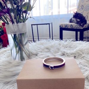 Coach, easy clasp bracelet. Never worn.